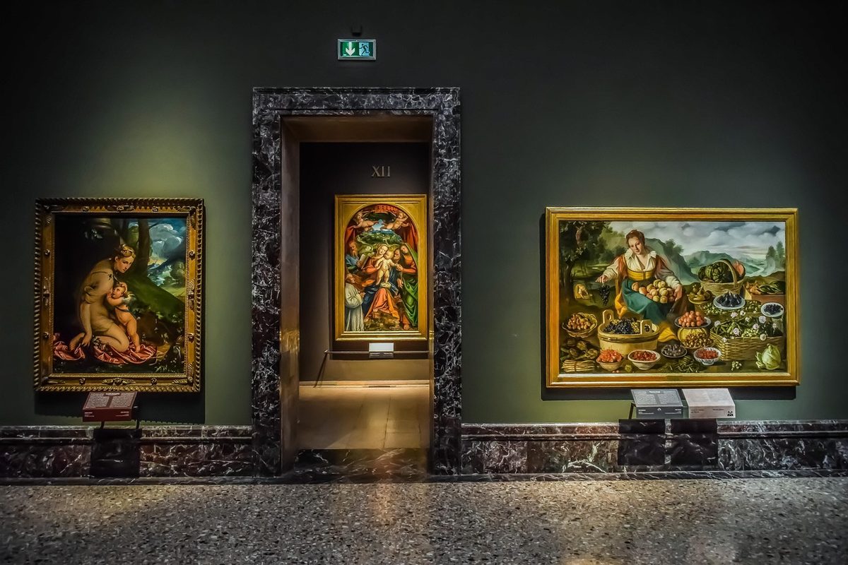 Museum gallery with paintings on display