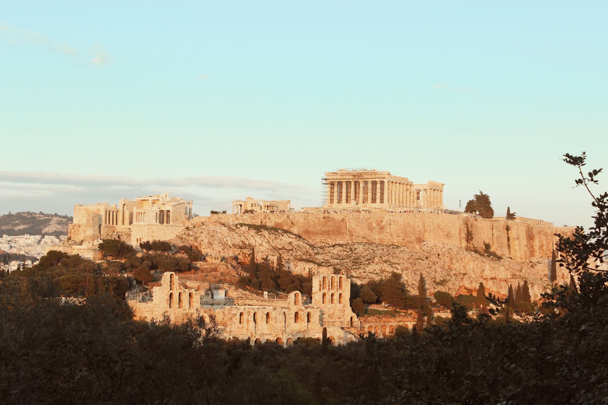 The Acropolis of Athens bathed in warm sunset light