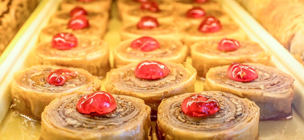 Golden baklava with honey syrup and chopped nuts