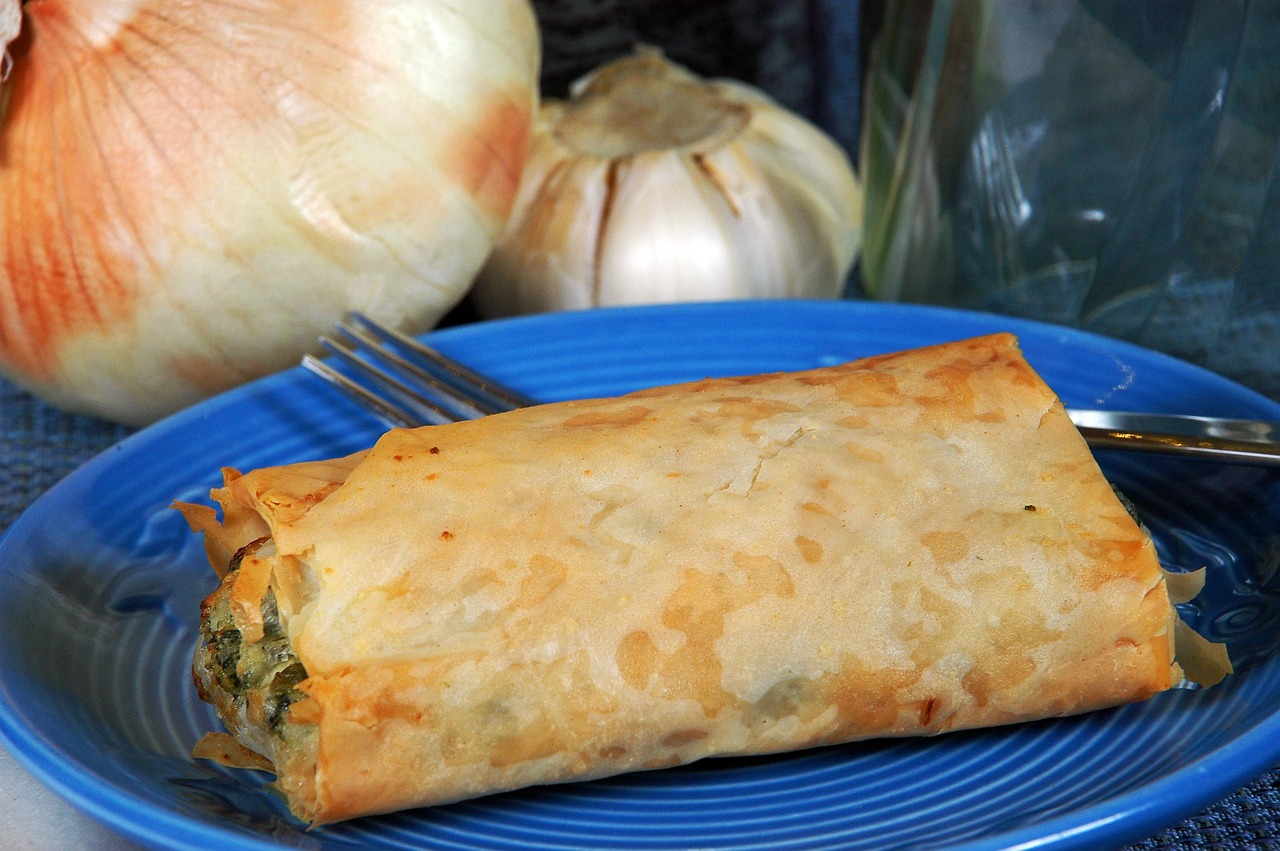 Golden baked spanakopita Greek spinach pie with filo pastry