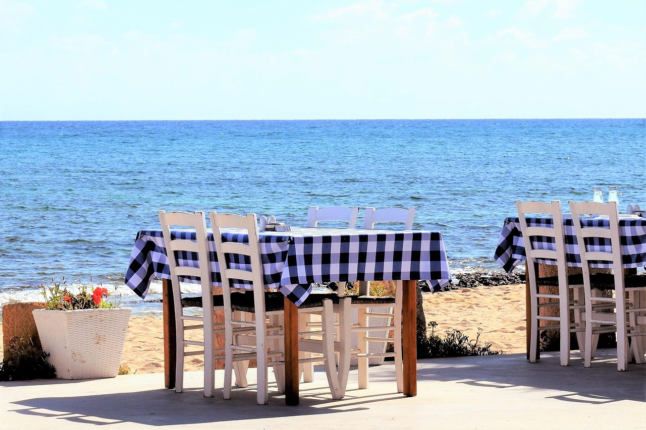 Blue and white tables at a Greek seaside taverna