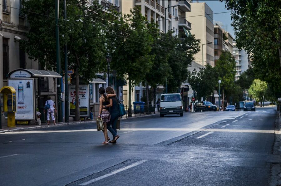 Athens street crossing pedestrians cars