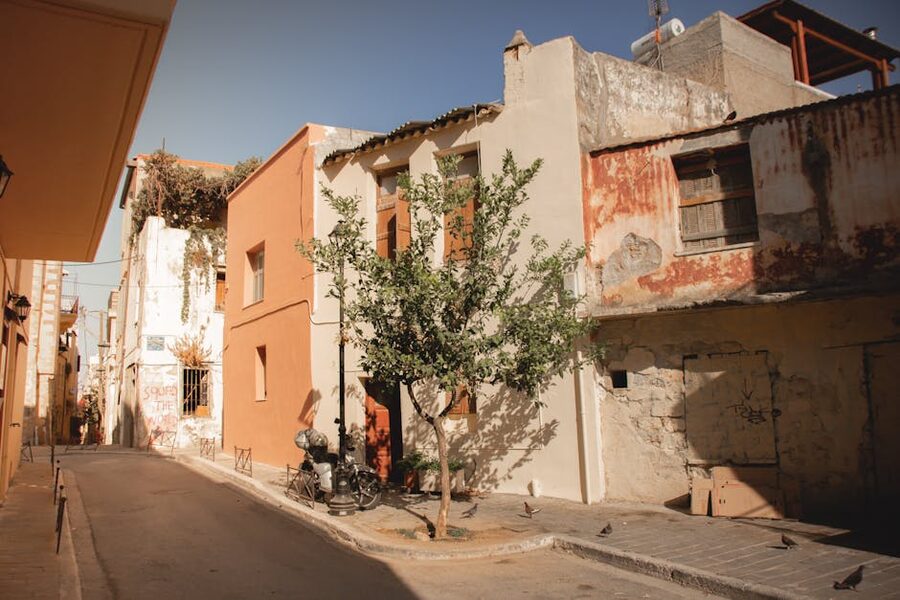 Athens sunlit street historic buildings