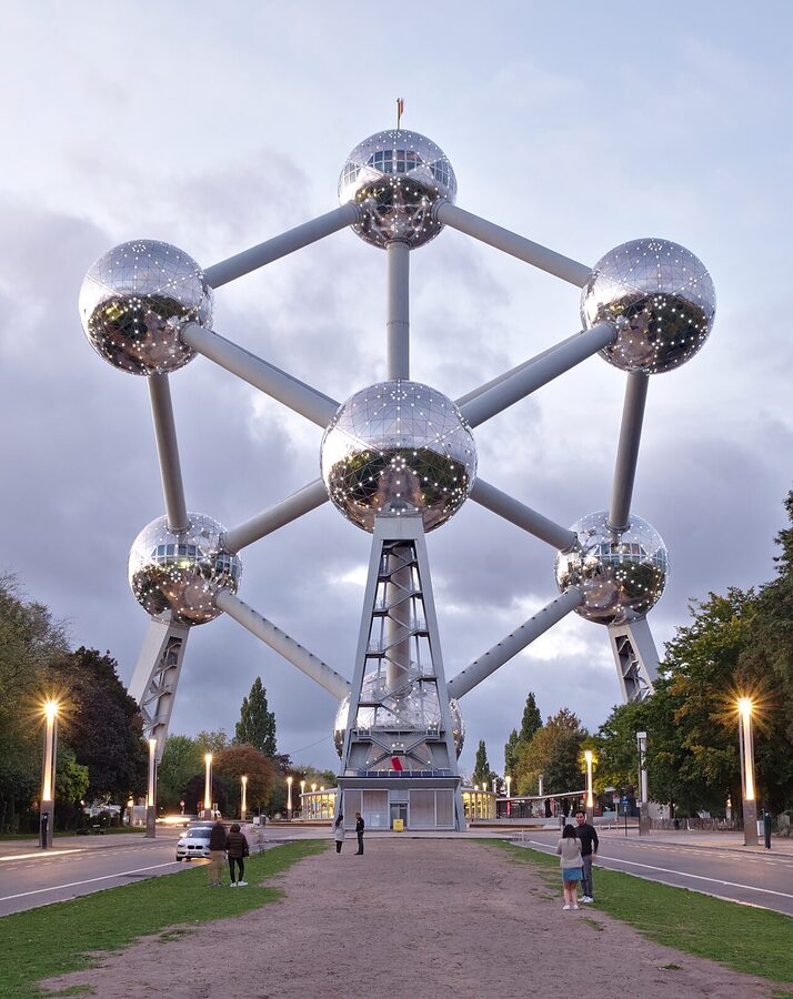 Atomium Brussels at twilight glowing against dusk sky
