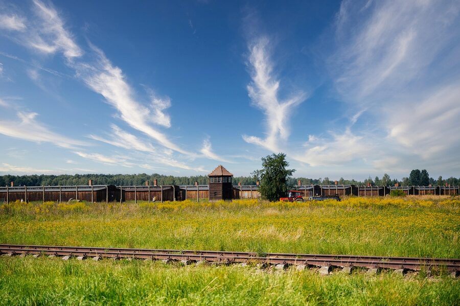 Auschwitz Birkenau camp buildings under flat light