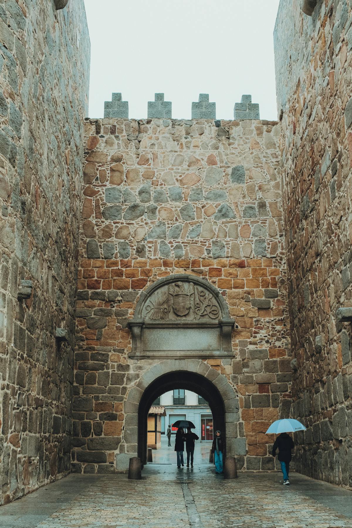 Medieval stone buildings and towers in the historic center of Avila, Spain