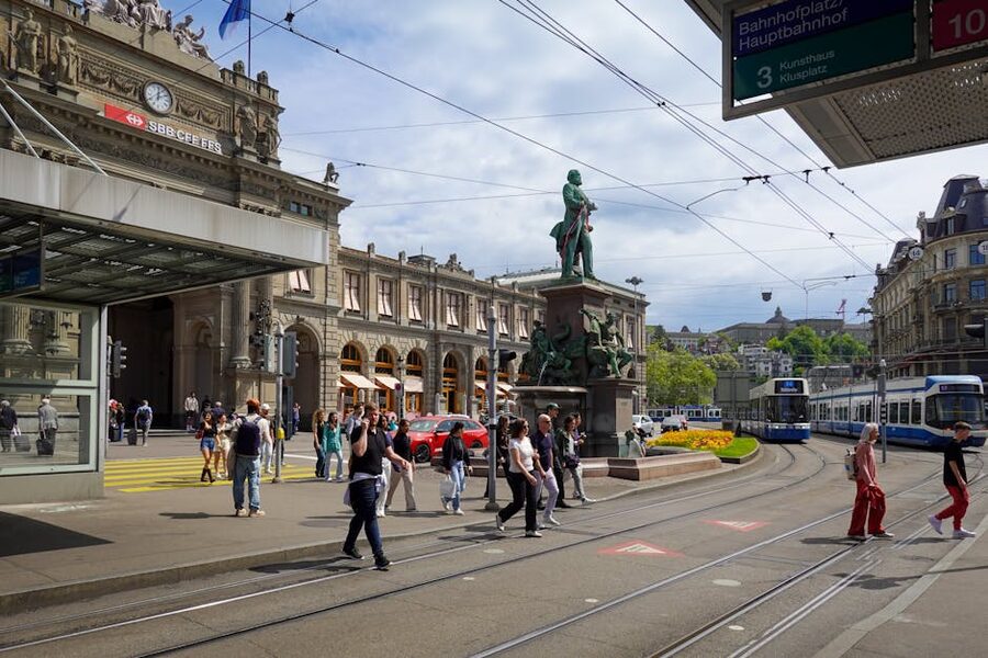 Bahnhofplatz Zurich with trams and historic architecture