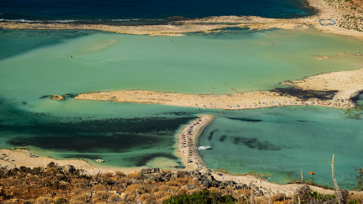 Aerial view of Balos Beach Lagoon sandy beach and turquoise waters