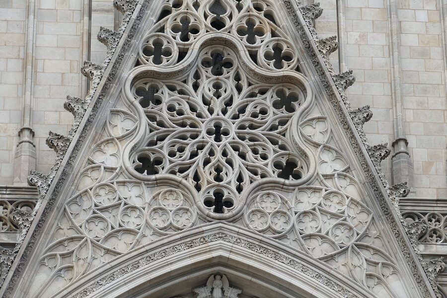 Interior of Barcelona Cathedral with Gothic arches and stonework