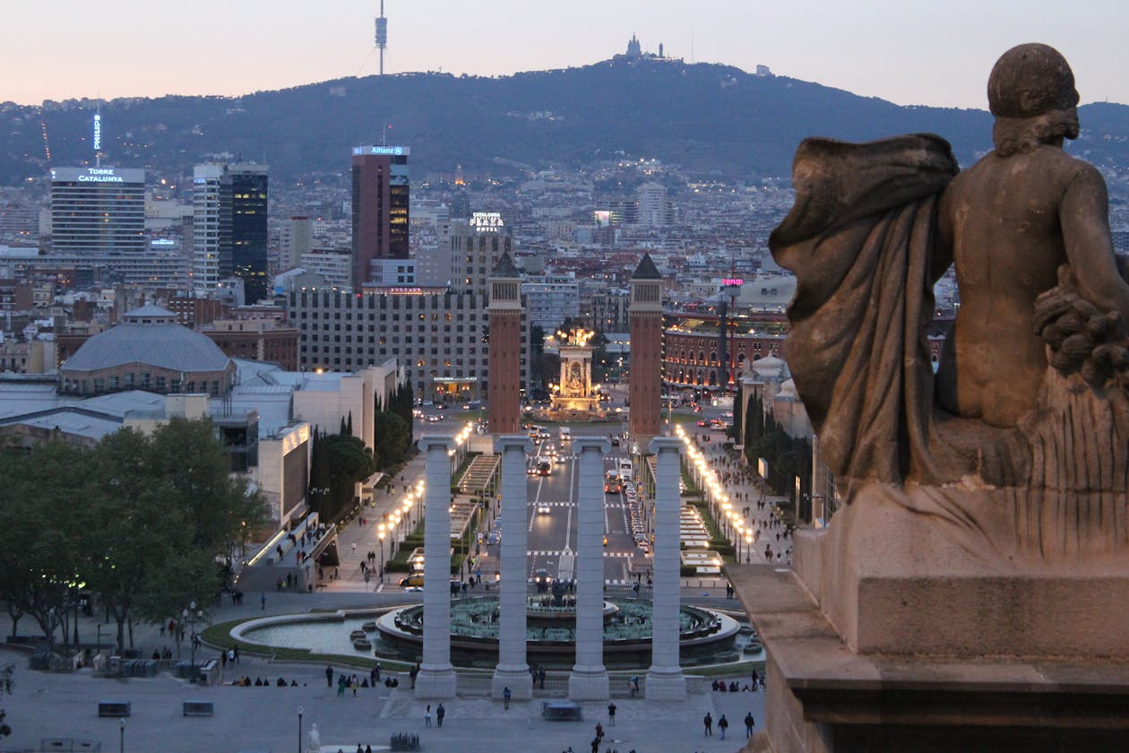 Barcelona urban landscape at dusk seen from Montjuic Hill