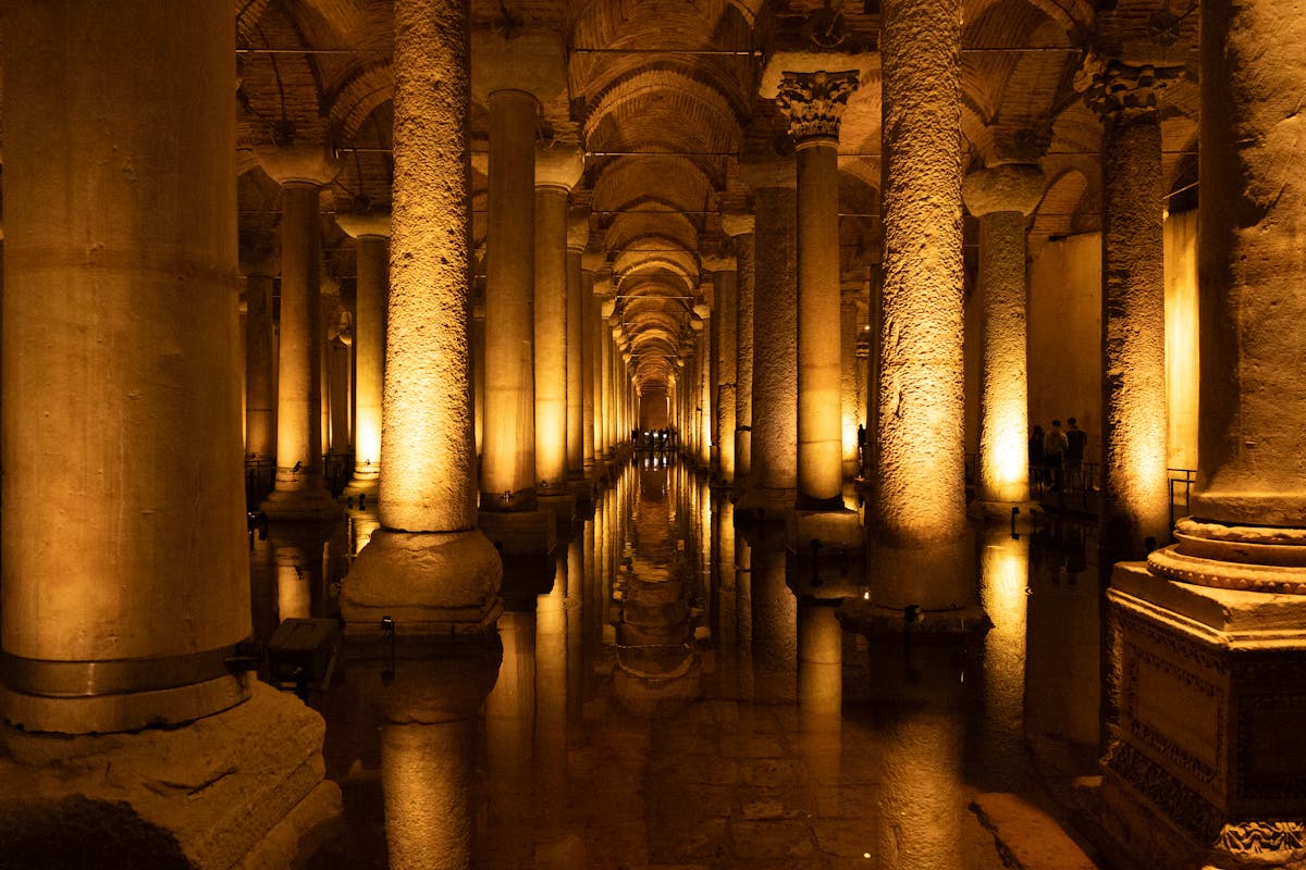 Illuminated arches and columns inside the Basilica Cistern in Istanbul