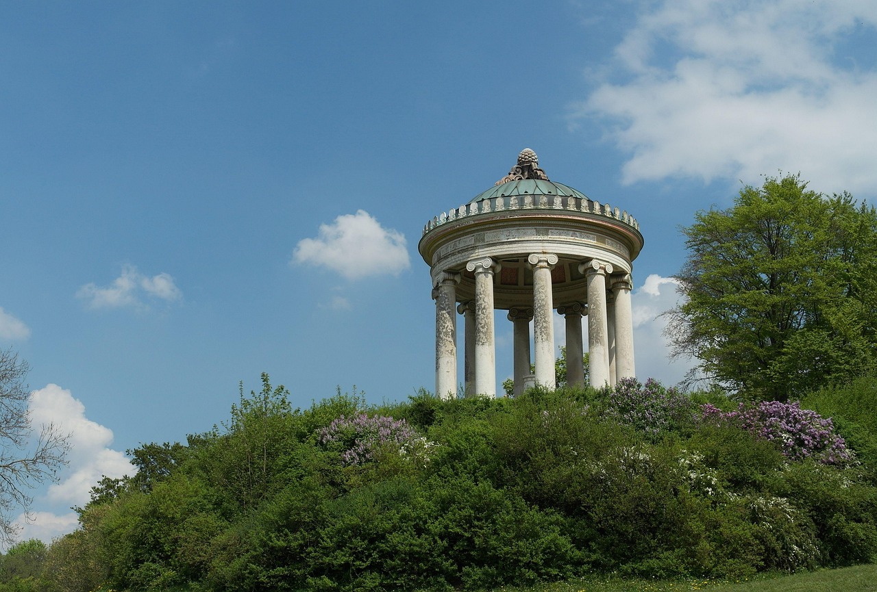 Wide view of the Monopteros temple in the English Garden Munich with surrounding parkland