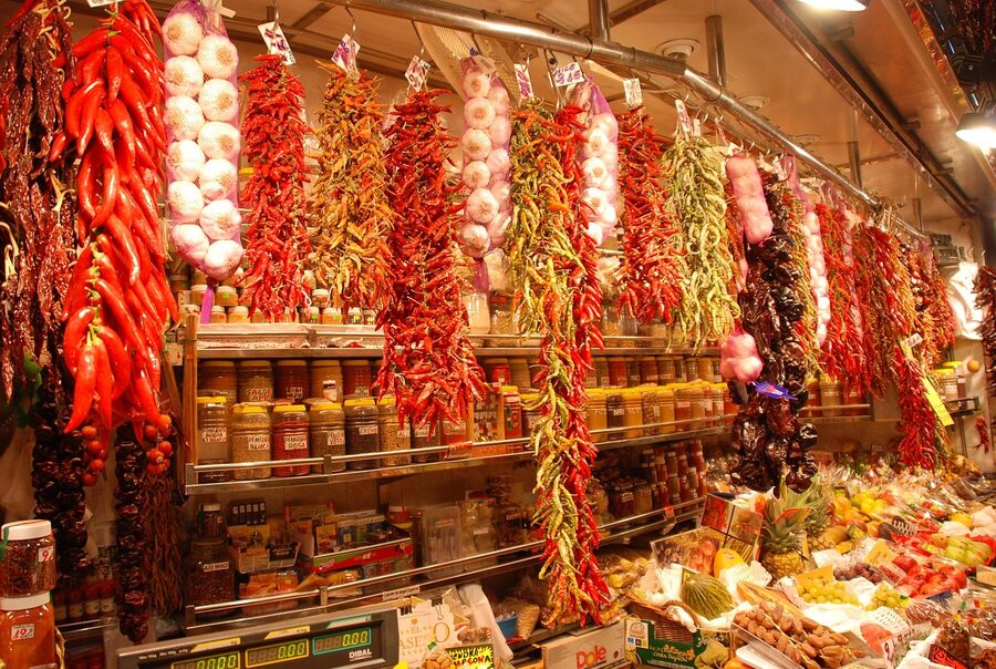 Peppers and vegetables displayed at La Boqueria food market in Barcelona Spain