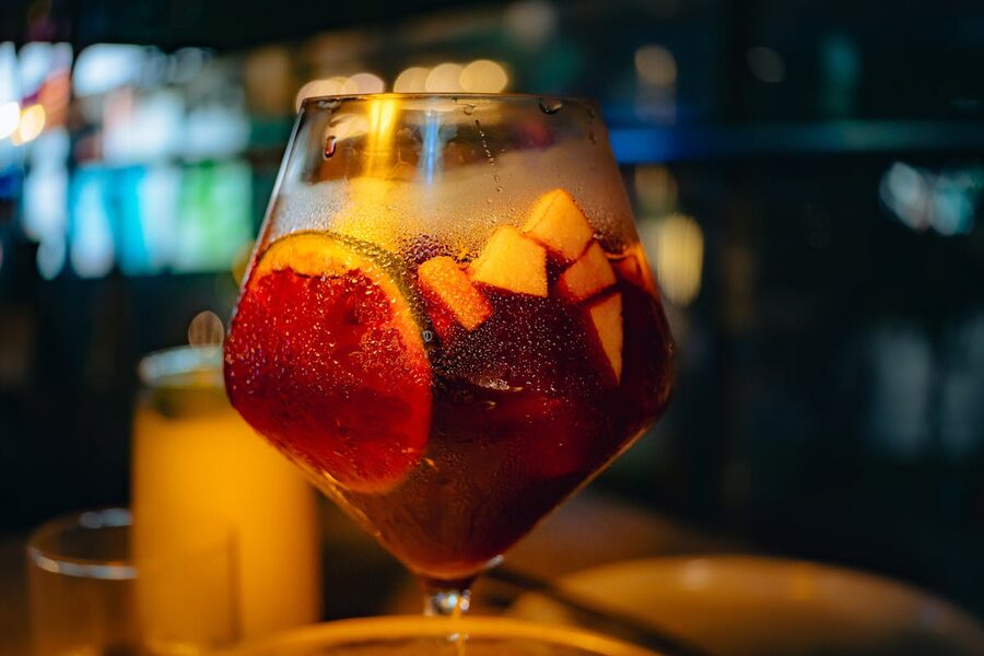 Close-up of a chilled glass of sangria with fresh fruit slices