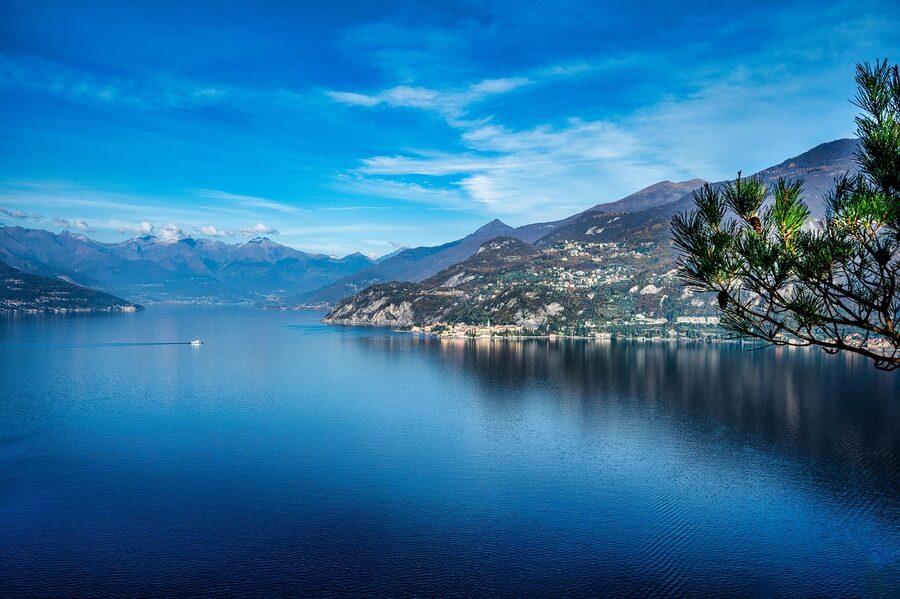 Lake Como mountain village of Varenna with colourful buildings along the waterfront