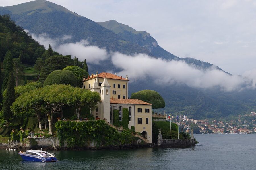 Villa del Balbianello on a promontory overlooking Lake Como surrounded by gardens and mountains