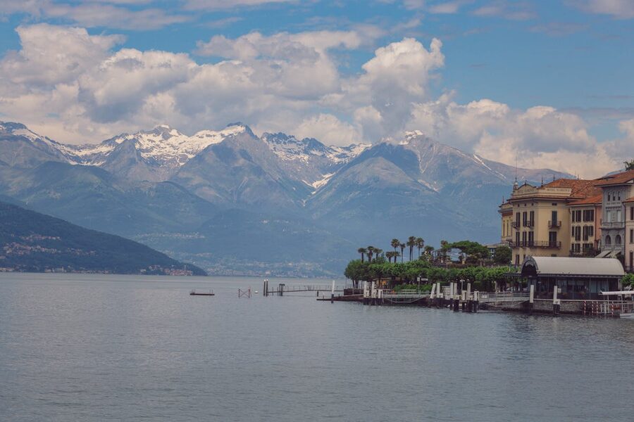 Panoramic view of Lake Como with Bellagio's colourful buildings and mountain backdrop