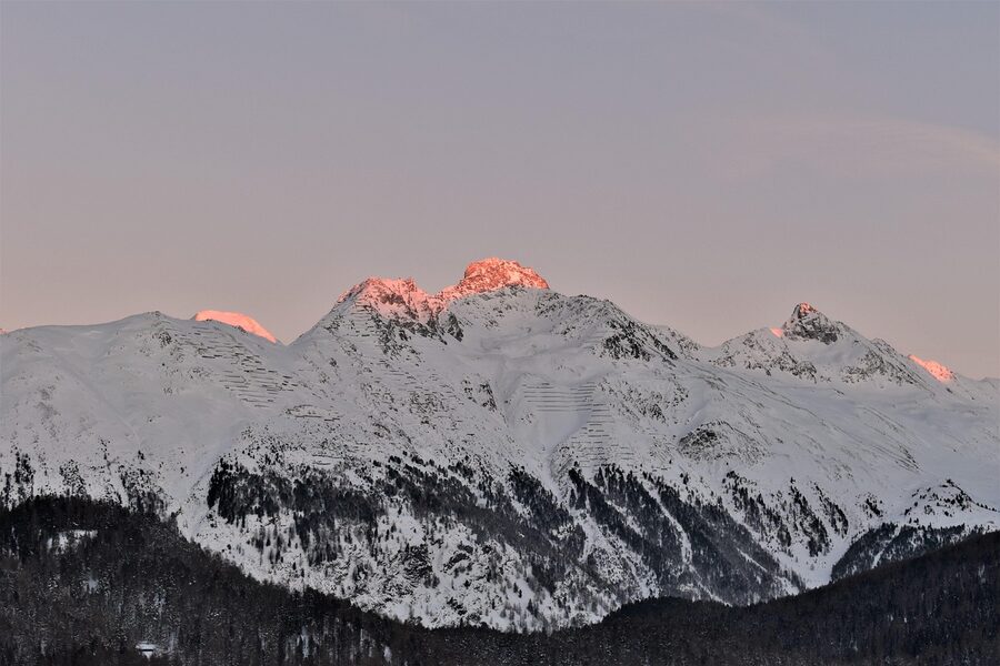 Winter view of St. Moritz ski slopes and mountains in Switzerland