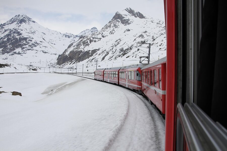 Bernina railway narrow gauge tracks curving through the Swiss Alps