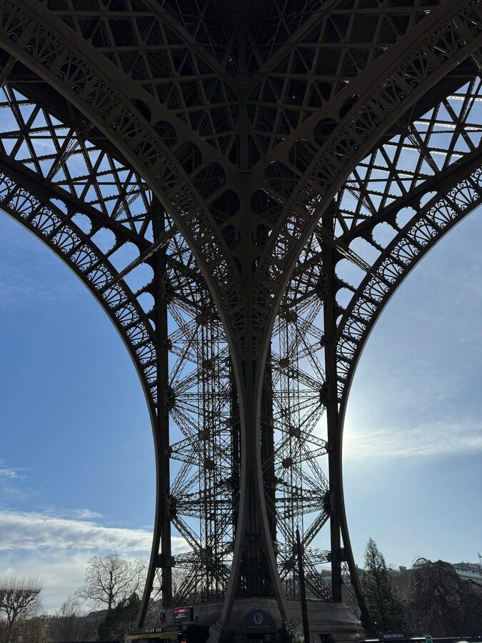 A couple embracing with the Eiffel Tower in the background
