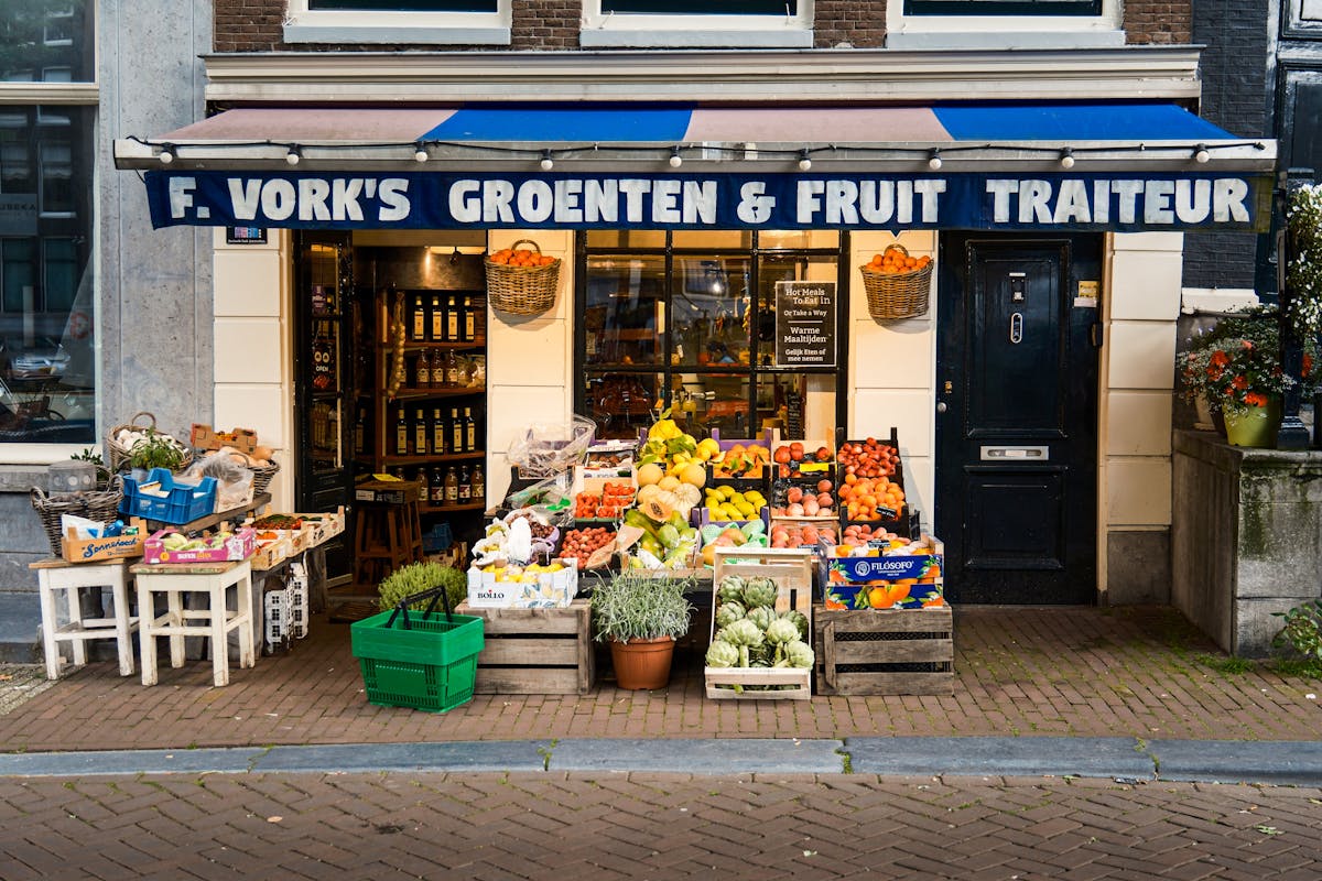 Colorful fruit and vegetable display outside Amsterdam grocery store