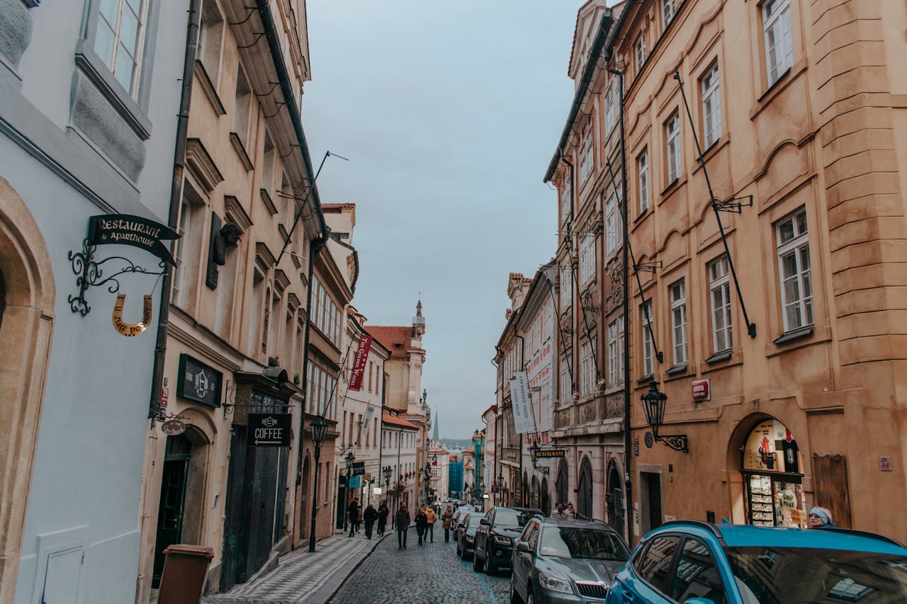 Historic Prague street with classic architecture and cobblestones