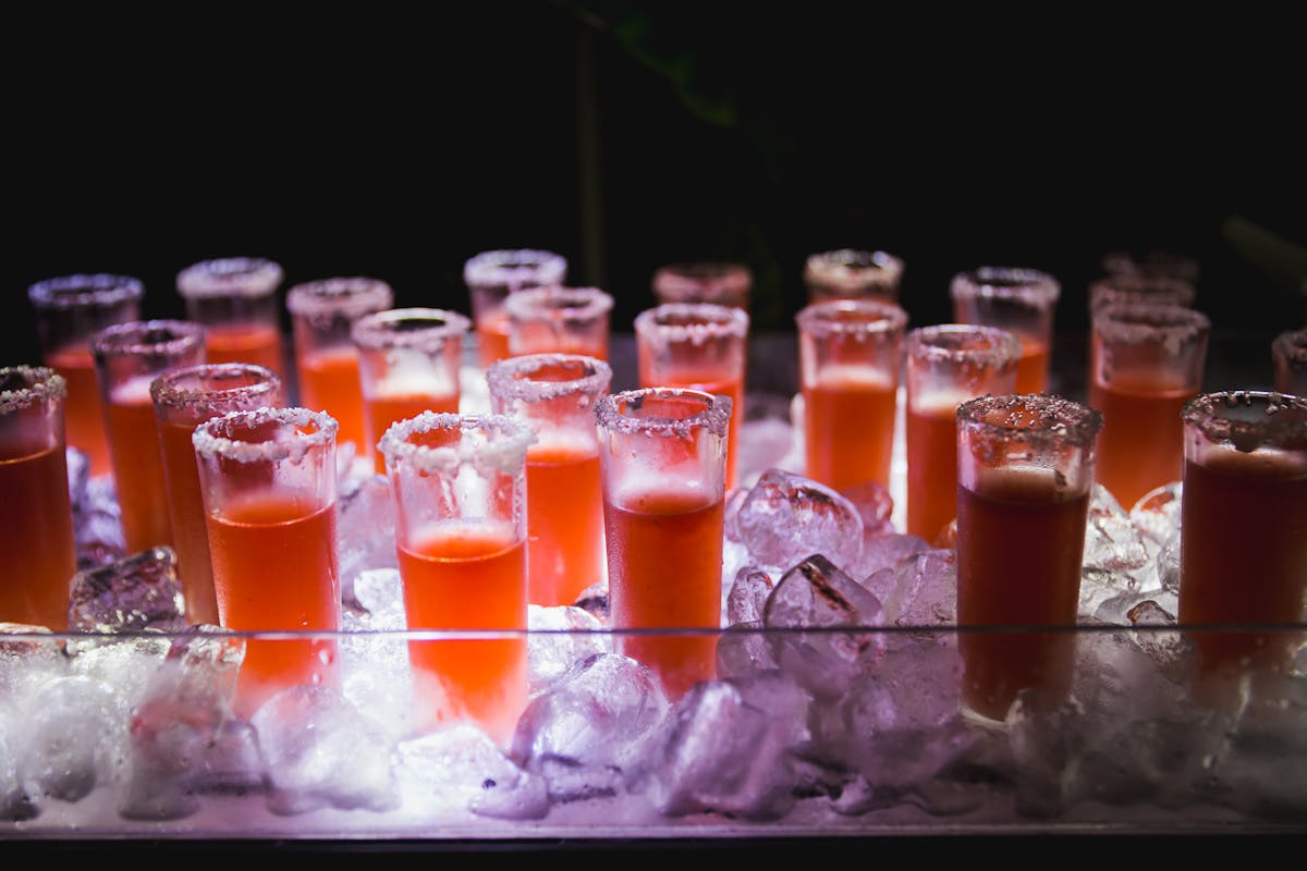 Vibrant display of red cocktails on ice