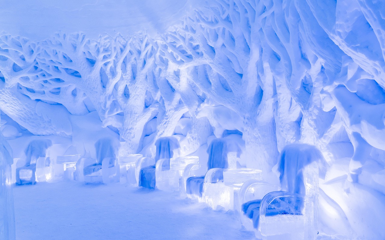 Ice bar interior with blue lighting and frozen counter