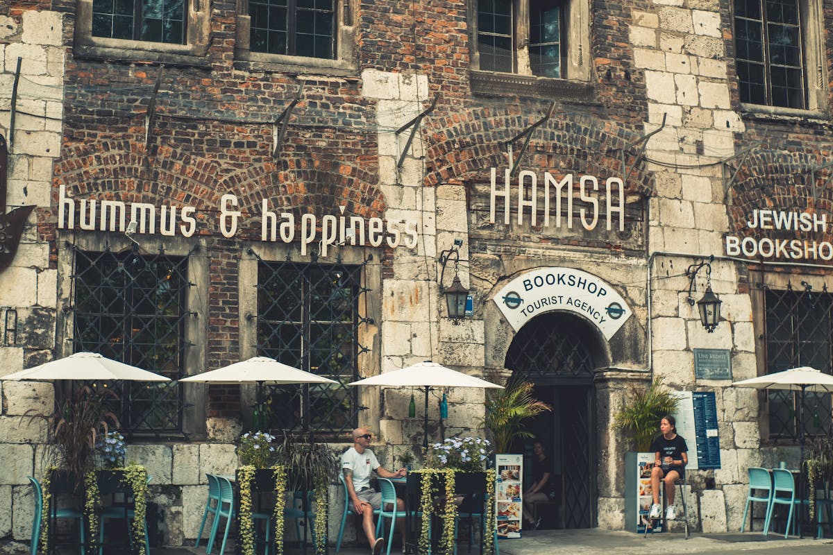 Charming cafe with outdoor seating in Krakow historic district Poland