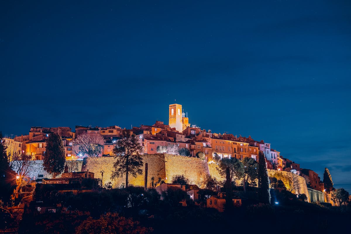 Saint Paul de Vence commune illuminated at night with ancient stone buildings