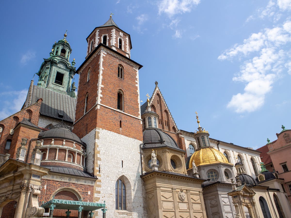 Wawel Royal Castle showing historic towers under clear sky Krakow Poland