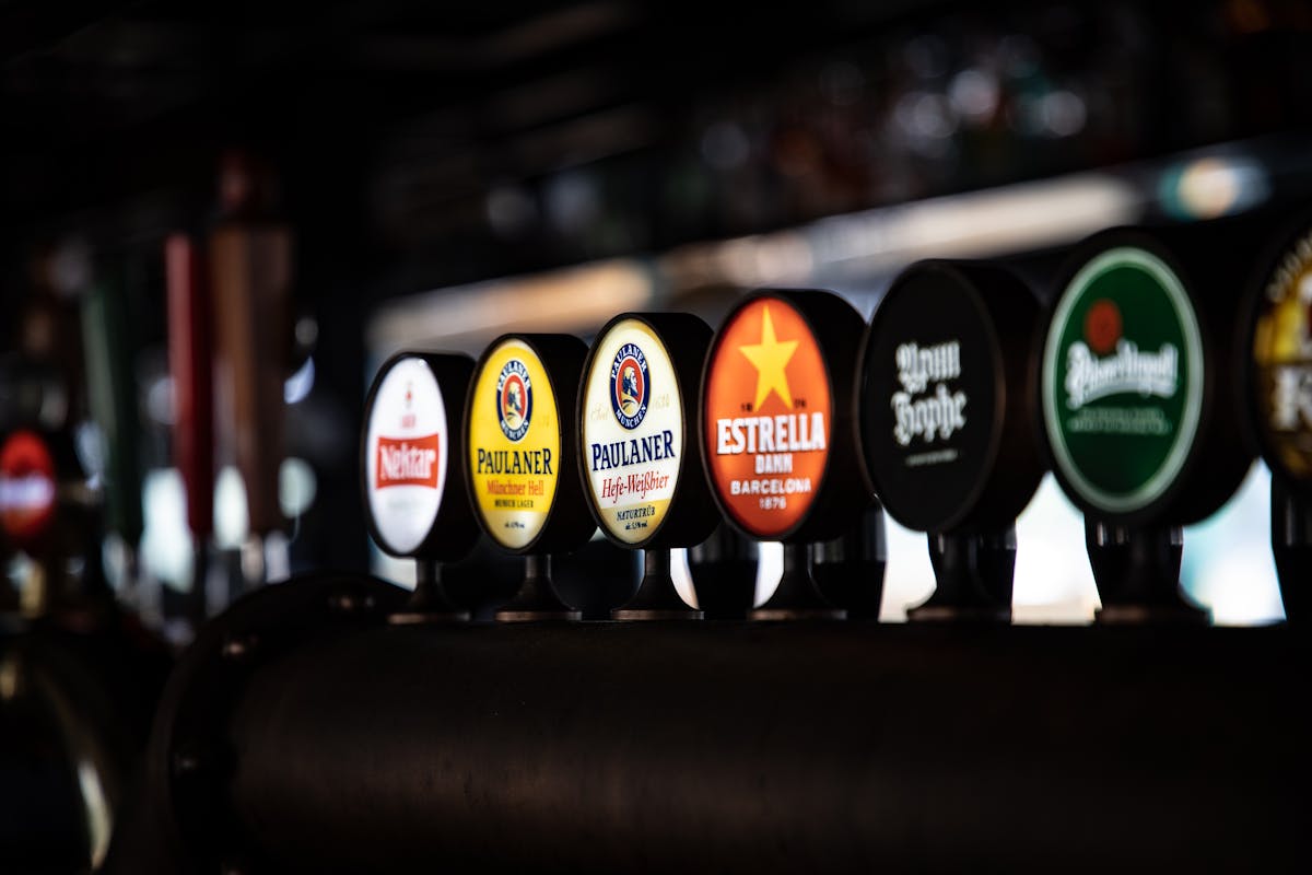 Close-up of beer taps on display in a German bar