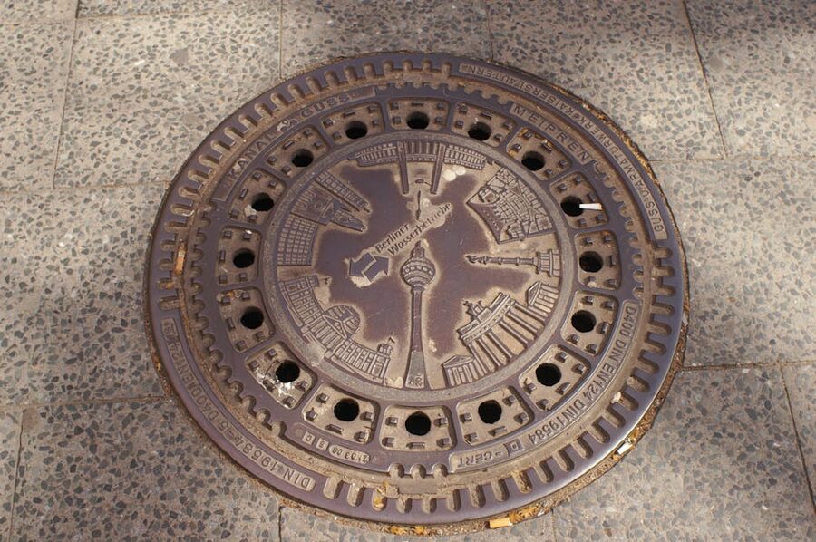 Berlin manhole cover with city landmarks