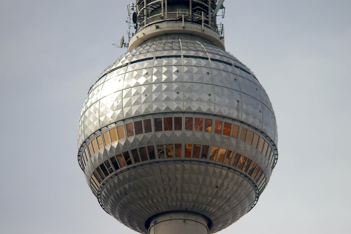 Close-up view of the Berlin TV Tower observation sphere and antenna