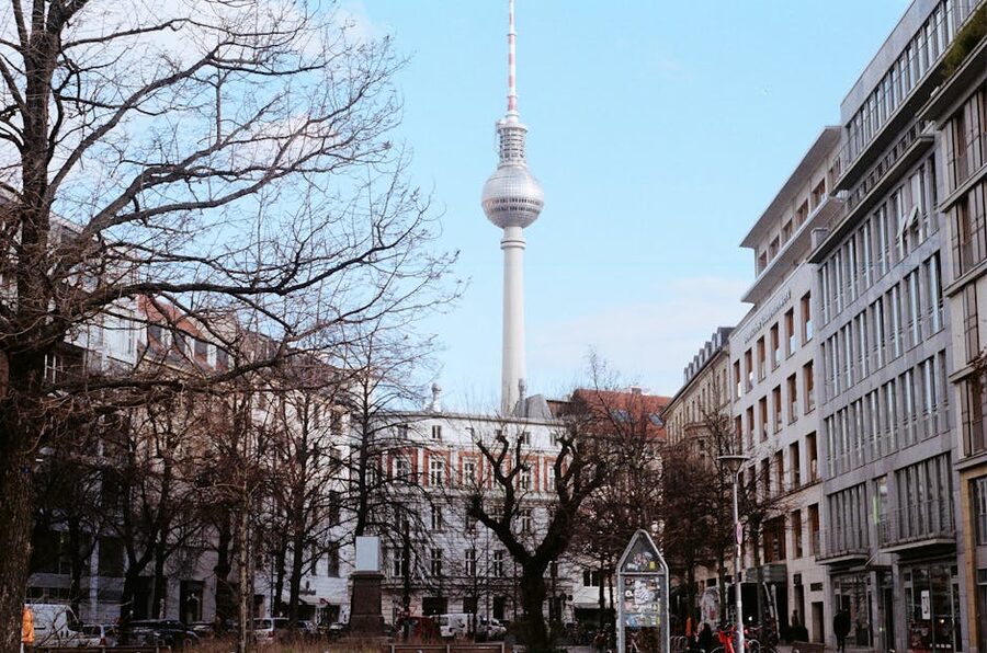 Berlin TV Tower with urban buildings