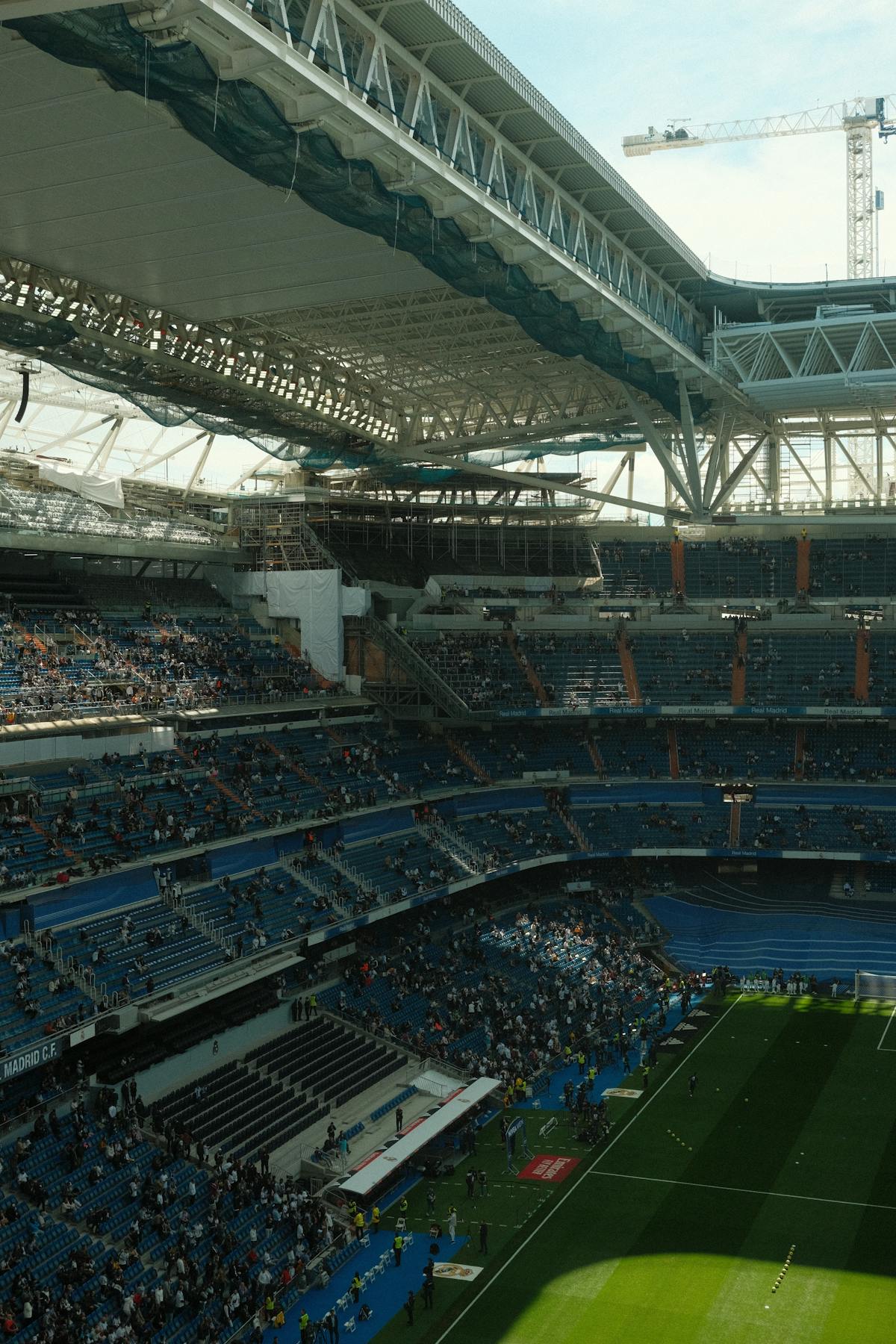 Santiago Bernabeu Stadium filled with fans during a match, capturing the electric atmosphere