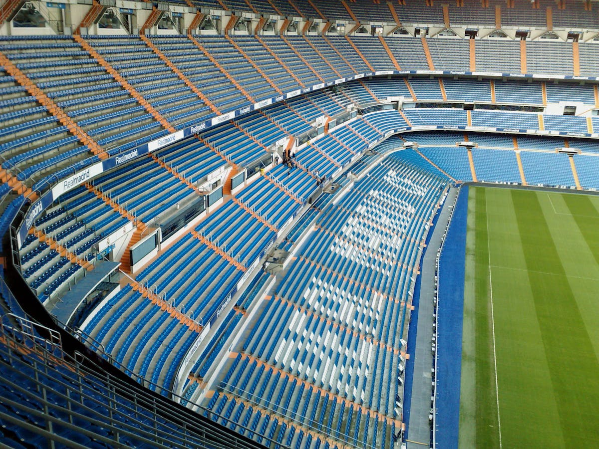 Modern architectural design of the seating area at Santiago Bernabeu Stadium