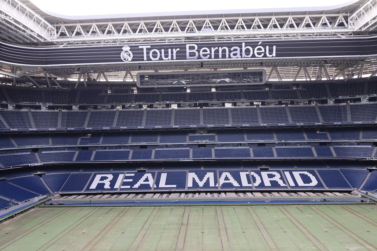 The Santiago Bernabeu Stadium in Madrid seen from outside, showing its full modern facade
