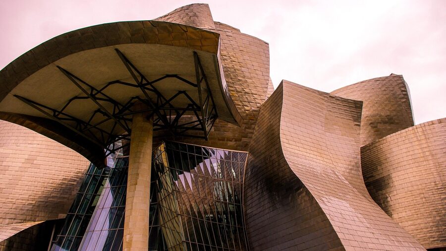 The curved titanium facade of the Guggenheim Museum Bilbao