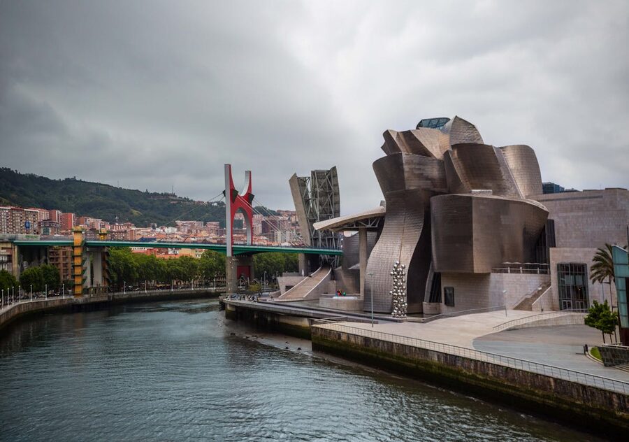 Panoramic view of the Guggenheim Museum and the white Zubizuri Bridge along the Nervion river in Bilbao