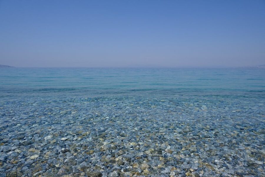 Pebble beach with clear turquoise water Croatia