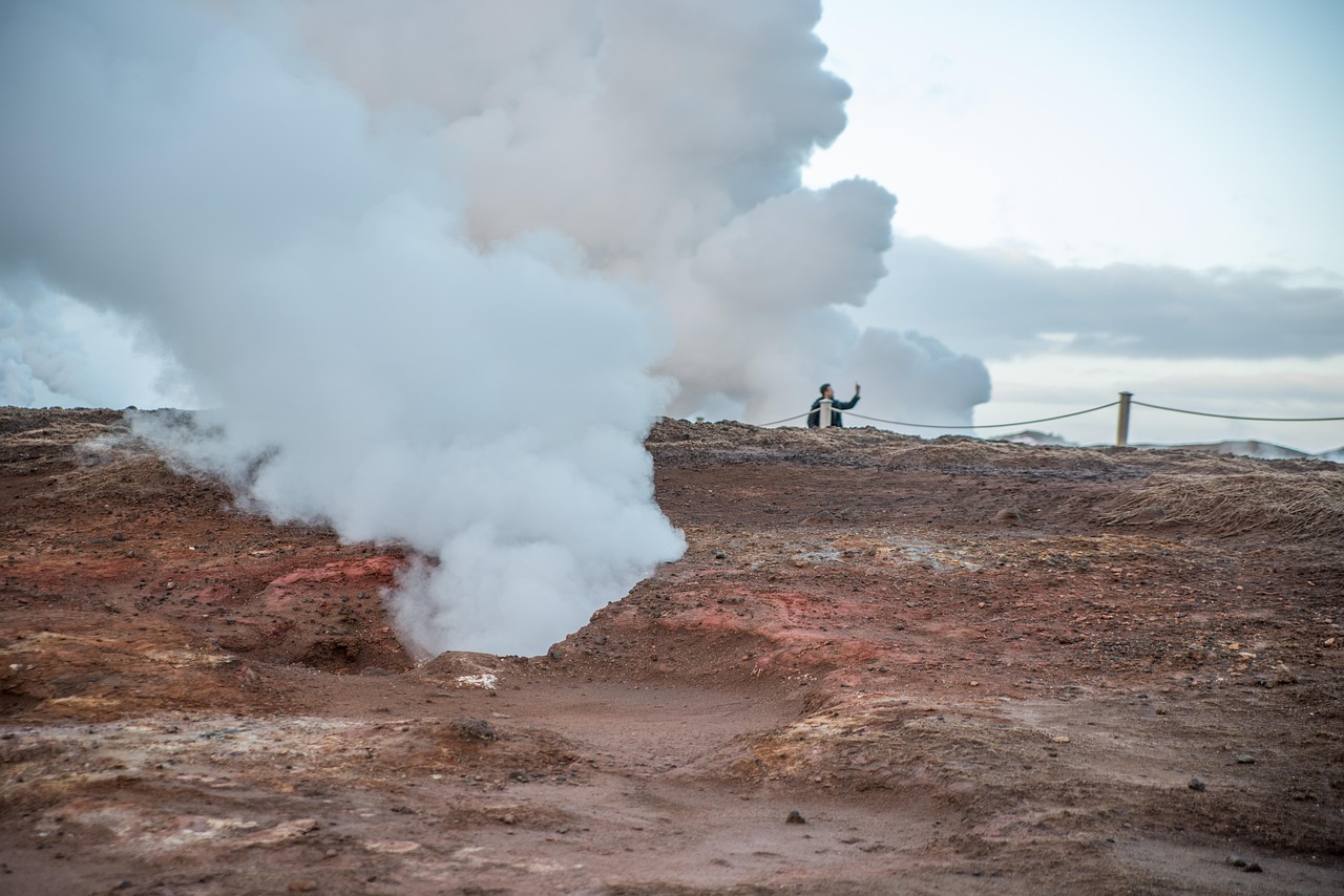 Geothermal steam vents and hot springs in the Icelandic landscape