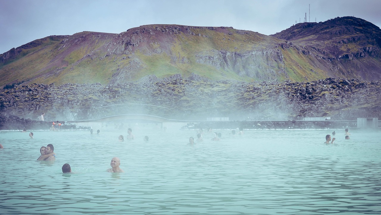 The Blue Lagoon thermal pool with steam rising from the milky blue water
