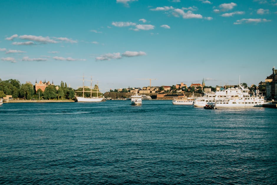 Cruise ship and boats along Stockholm waterfront on a summer day