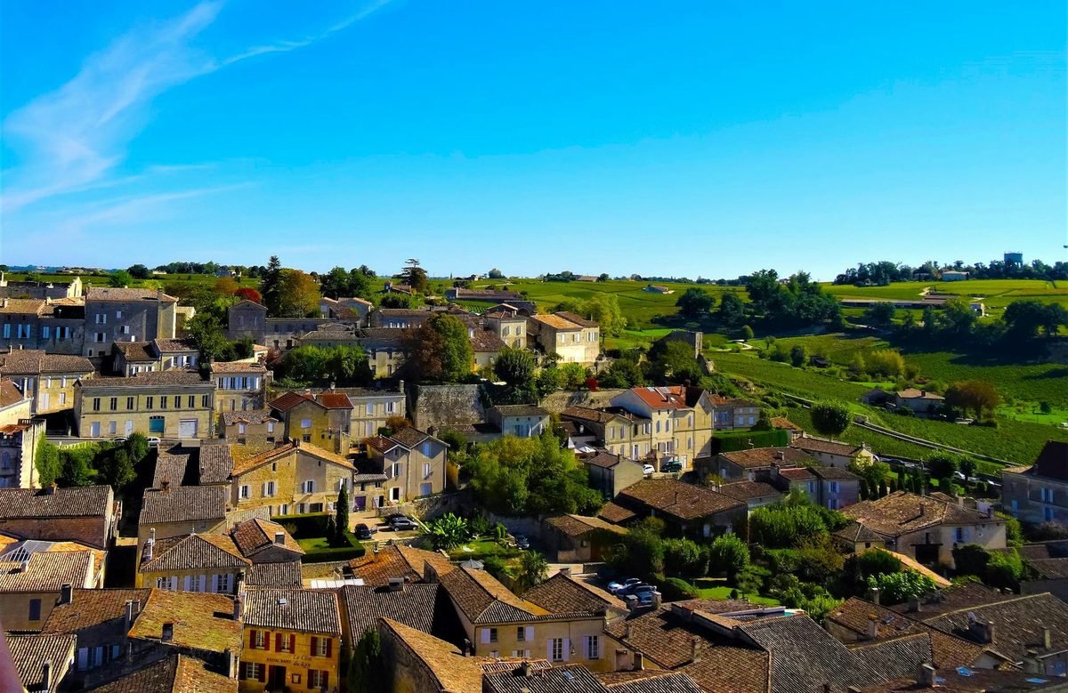 Aerial view of Saint-Emilion village surrounded by vineyards in Bordeaux wine region