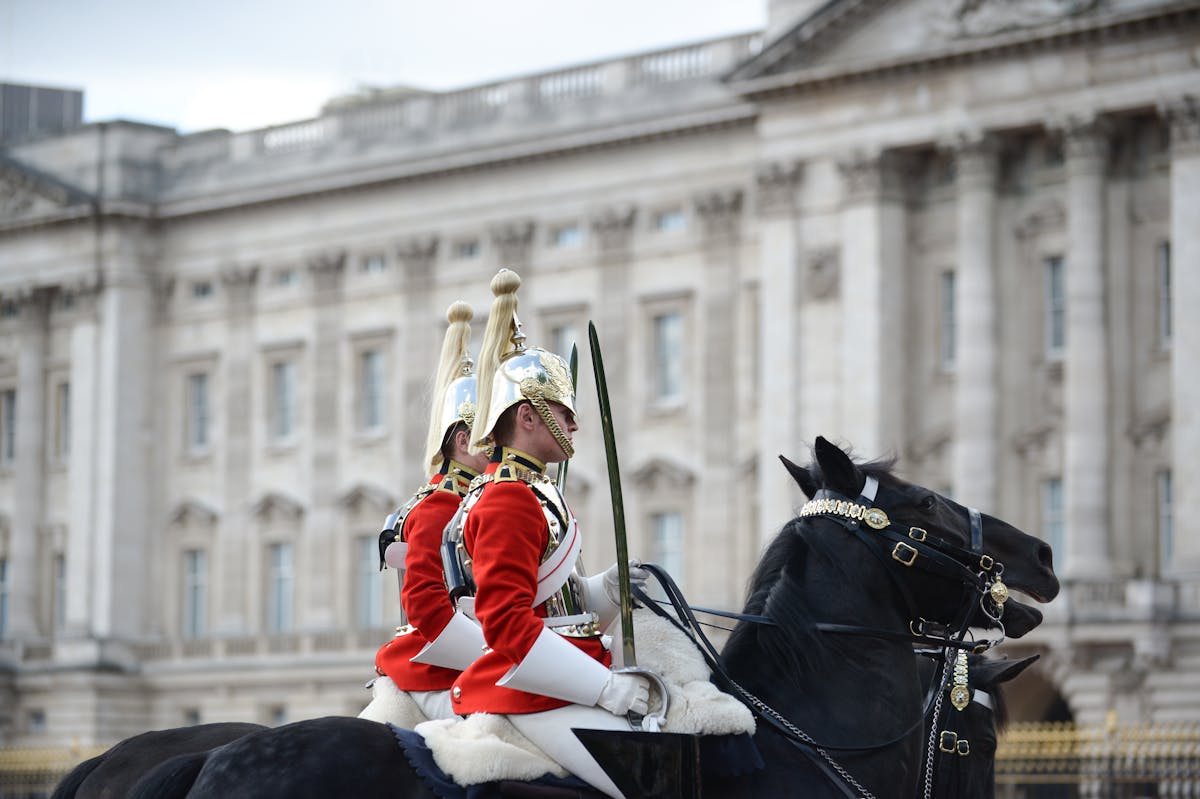 Mounted Life Guards in ceremonial uniforms on horseback near Buckingham Palace