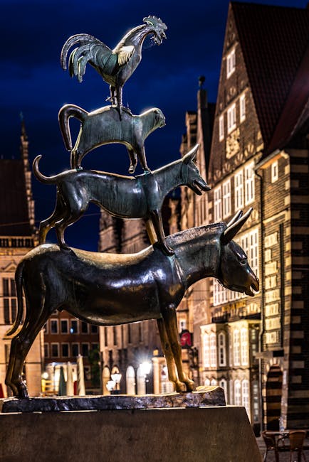 The Town Musicians of Bremen bronze statue at night