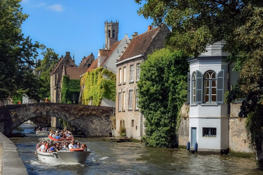 Bruges canal with boats in the old town