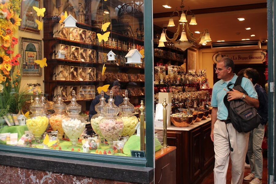 Bruges chocolate shop window display with assorted sweets