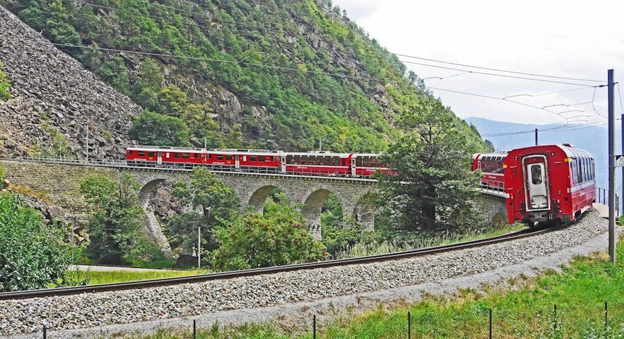 Brusio spiral viaduct Bernina railway with red train